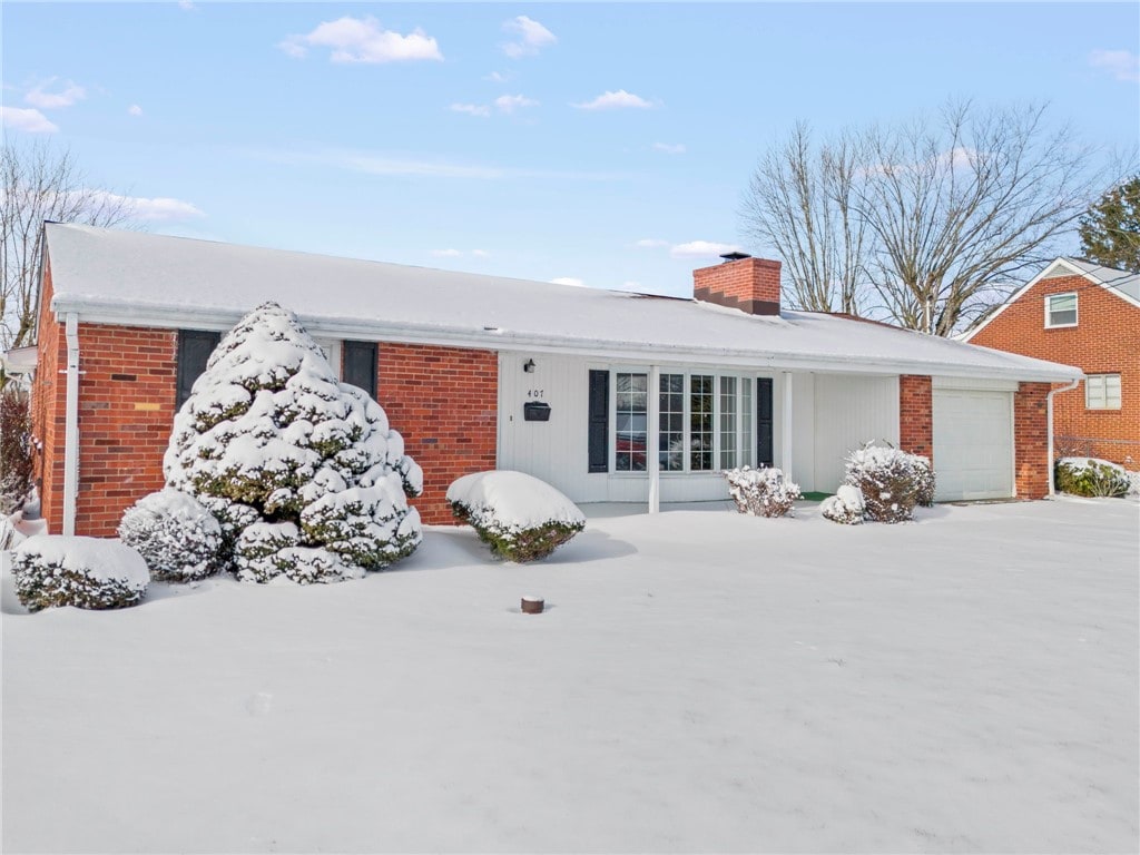 single story home with a garage