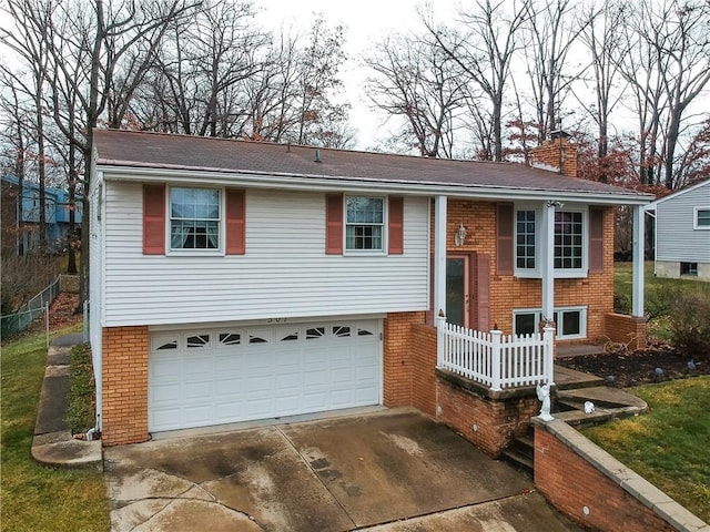 bi-level home featuring a garage