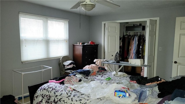 bedroom featuring a closet and ceiling fan