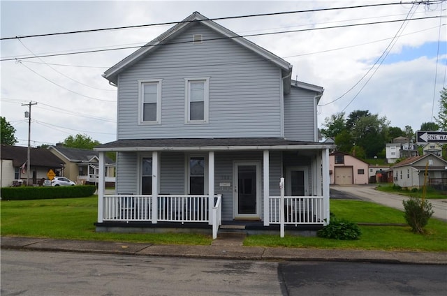 view of front facade with a porch and a front yard