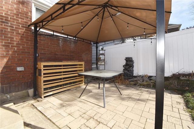 view of patio featuring a gazebo