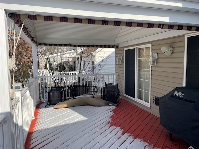 wooden deck with grilling area