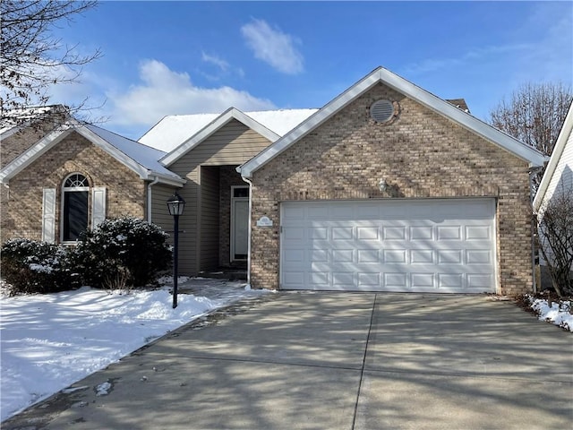 view of front of home with a garage