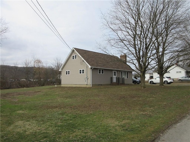 view of home's exterior featuring a lawn