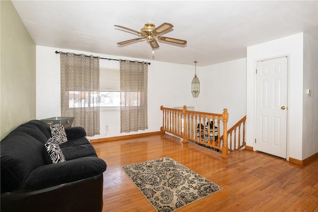 216 Karen Dr, Allegheny Twp Wml, PA 15613 - living room with baseboards, wood finished floors, and ceiling fan