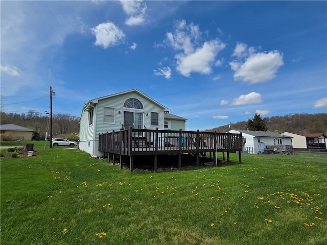 216 Karen Dr, Allegheny Twp Wml, PA 15613 - back of house with a wooden deck and a yard