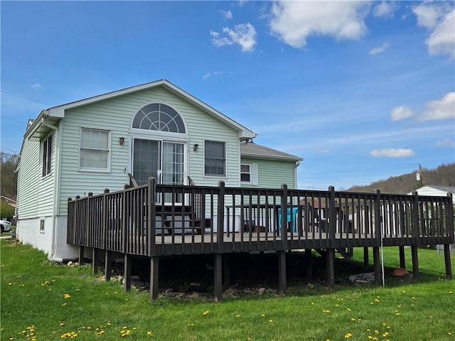 216 Karen Dr, Allegheny Twp Wml, PA 15613 - rear view of property featuring a lawn and a wooden deck