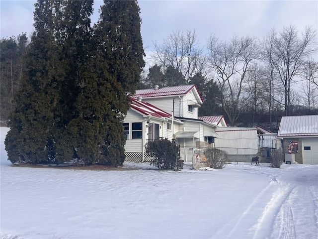 view of front facade with a standing seam roof and metal roof