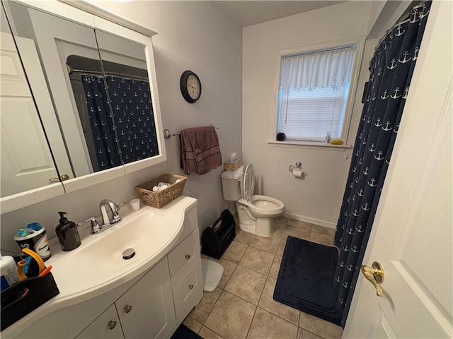 bathroom with tile patterned floors, toilet, vanity, and a shower with shower curtain