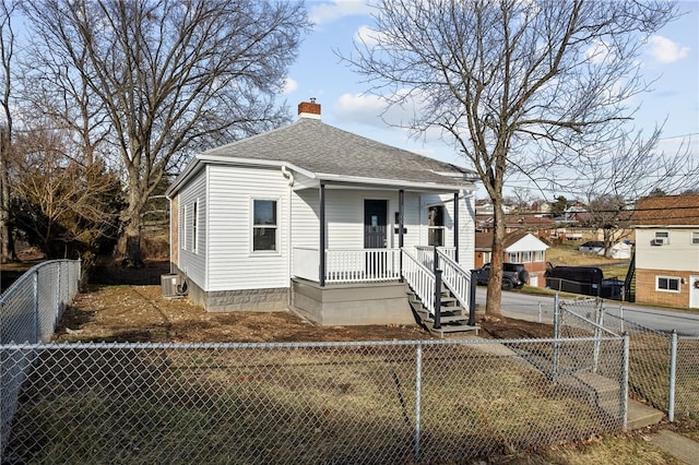 bungalow featuring central air condition unit