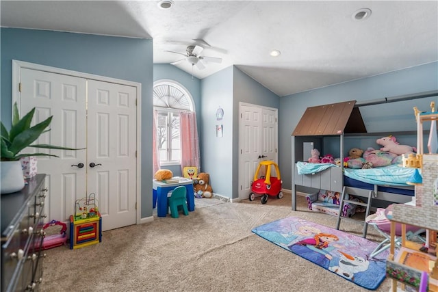 game room featuring vaulted ceiling, ceiling fan, and carpet floors