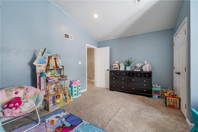 game room with carpet floors and vaulted ceiling