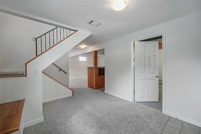 empty room with carpet flooring