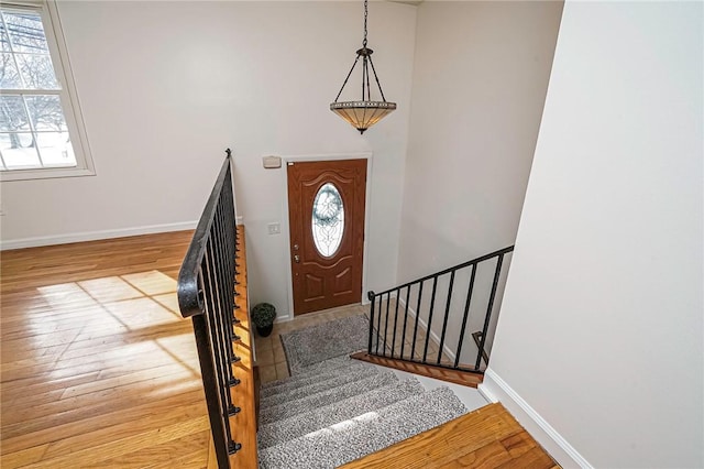 entryway with light wood-type flooring and a wealth of natural light