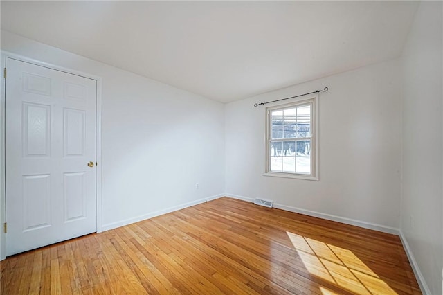 empty room featuring light hardwood / wood-style flooring