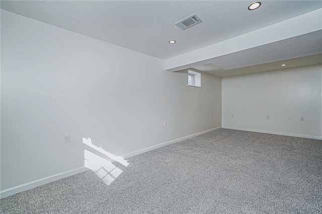 basement featuring carpet flooring