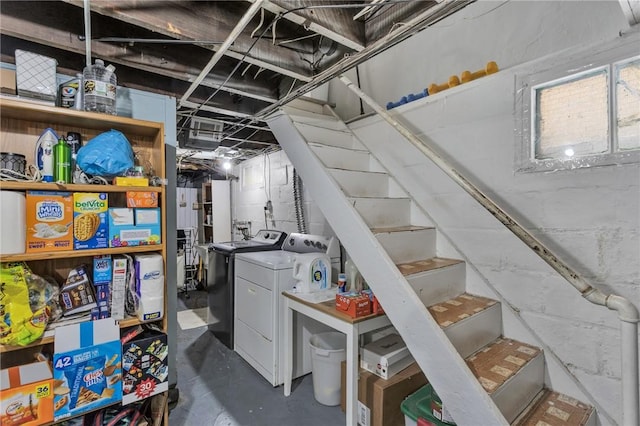 basement with washing machine and clothes dryer