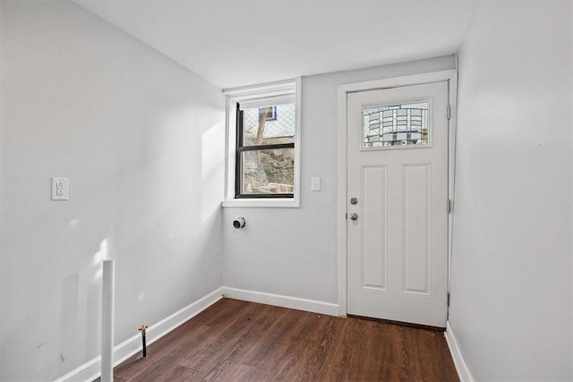 doorway to outside with dark hardwood / wood-style floors