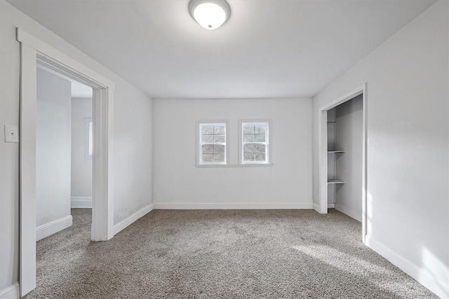 unfurnished bedroom with carpet flooring