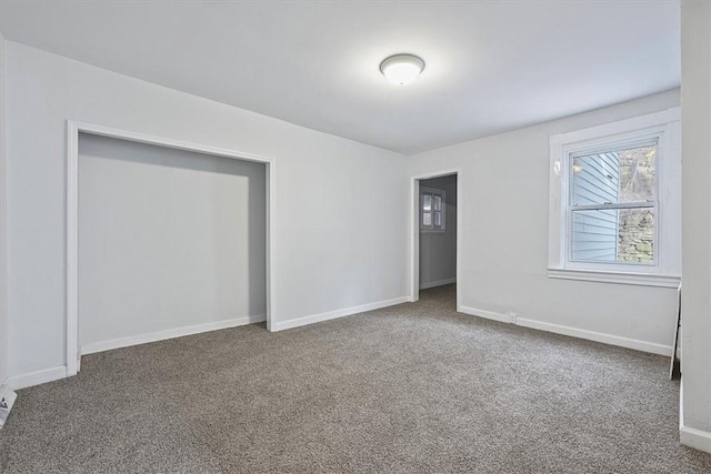 unfurnished bedroom with carpet floors