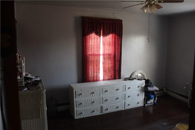 bedroom with ceiling fan and dark hardwood / wood-style flooring