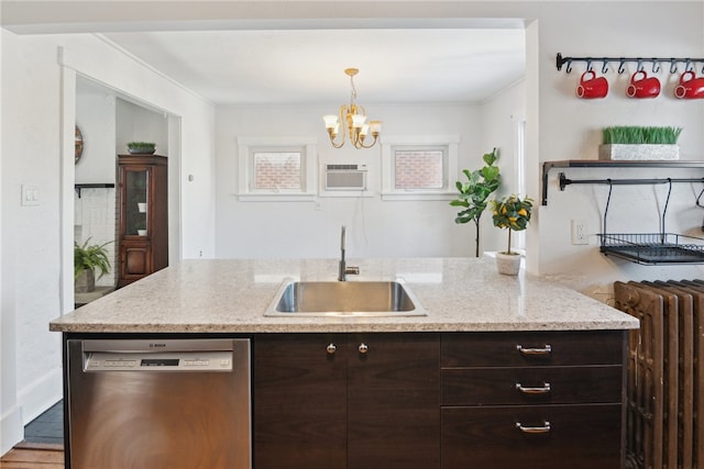 kitchen featuring dishwasher, radiator heating unit, hanging light fixtures, dark brown cabinets, and a sink