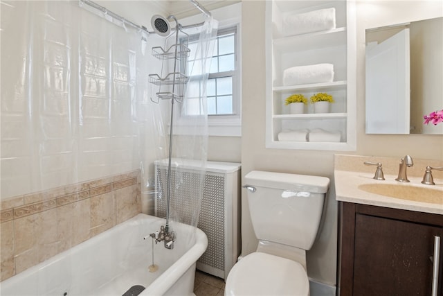 bathroom featuring toilet, shower / bath combo with shower curtain, and vanity