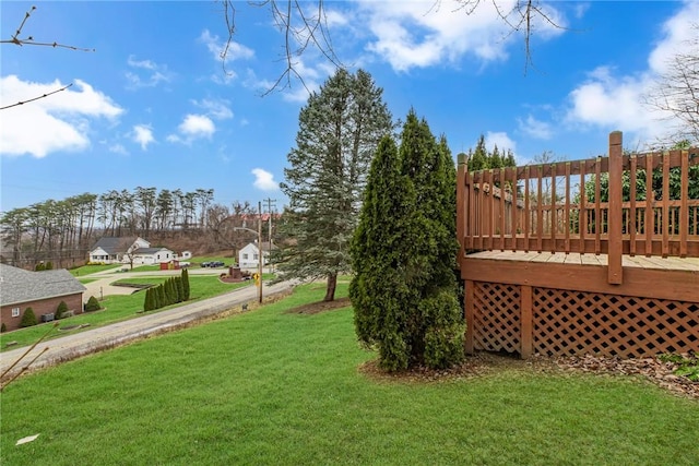 view of yard featuring a deck