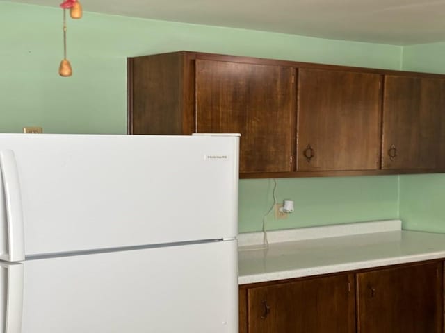 kitchen featuring white refrigerator