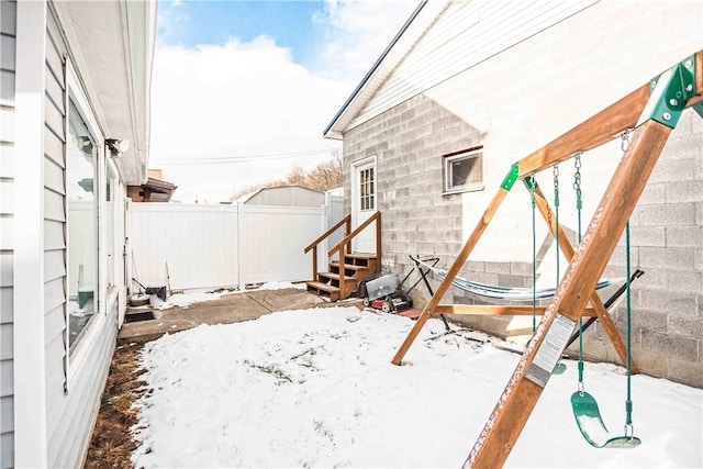 view of yard covered in snow