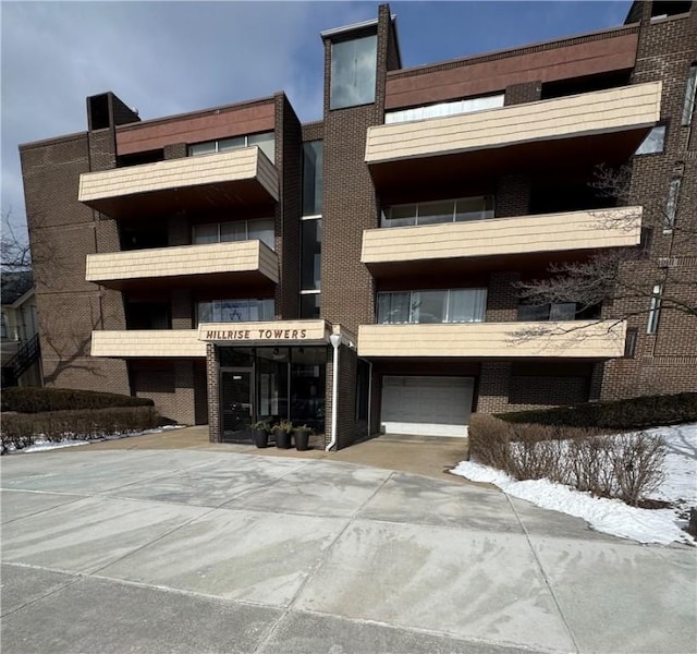 view of building exterior featuring a garage