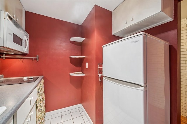 5841 Morrowfield Ave Unit 206, Squirrel Hill, PA 15217 - bathroom with tile patterned flooring, vanity, and baseboards