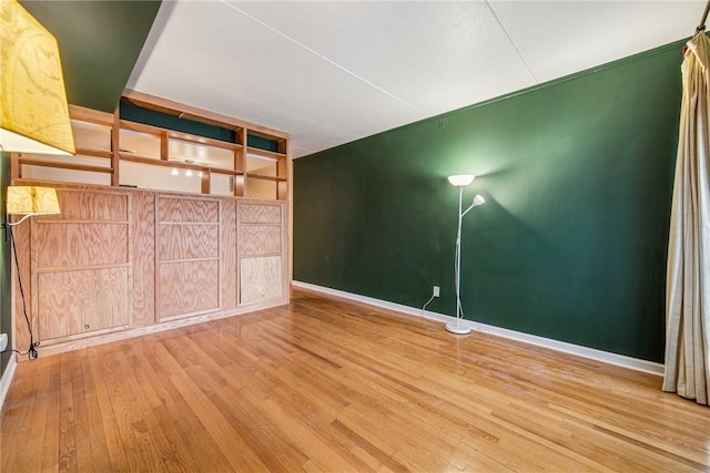 5841 Morrowfield Ave Unit 206, Squirrel Hill, PA 15217 - unfurnished room featuring baseboards and wood finished floors