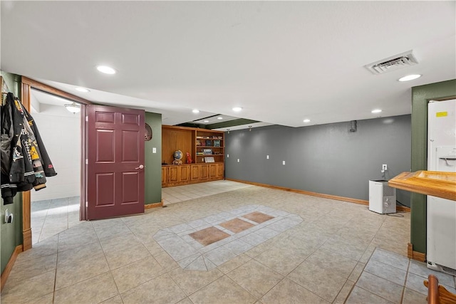 interior space featuring light tile patterned flooring