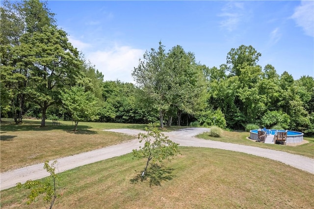 view of community featuring a lawn