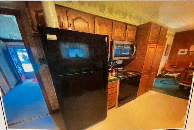 kitchen with black appliances