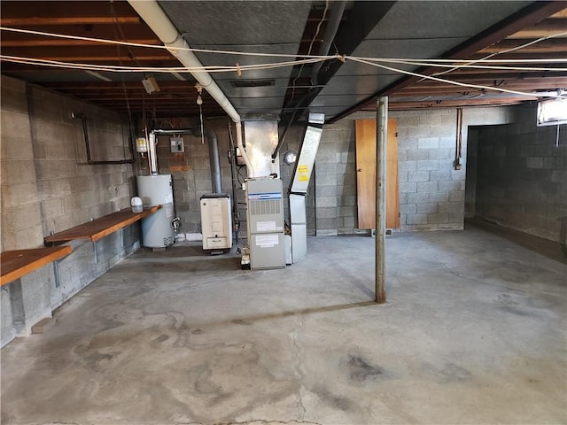 basement with gas water heater and heating unit