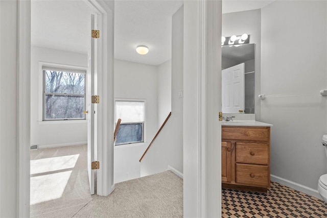 bathroom with vanity and toilet