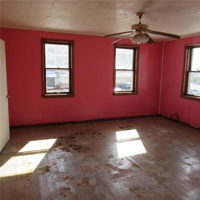 unfurnished room featuring ceiling fan