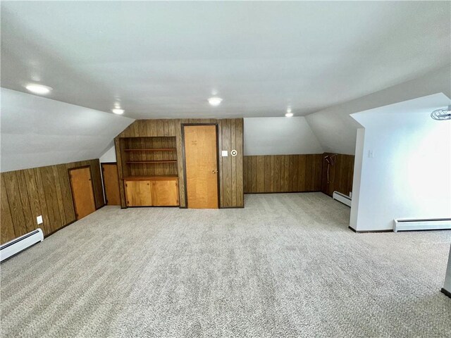 302 S Main St, Masontown, PA 15461 - additional living space featuring wooden walls, a baseboard heating unit, light carpet, and lofted ceiling