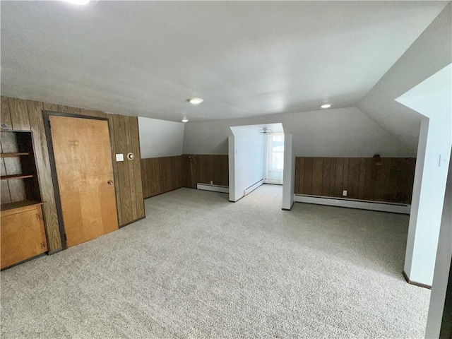 302 S Main St, Masontown, PA 15461 - bonus room with a baseboard heating unit, wood walls, carpet, and lofted ceiling
