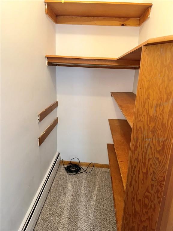 302 S Main St, Masontown, PA 15461 - spacious closet with a baseboard radiator and carpet flooring