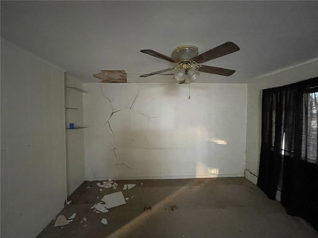 spare room featuring ceiling fan