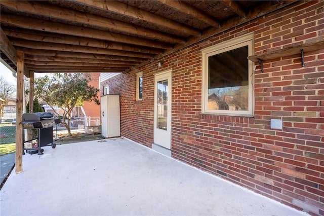 view of patio with a grill