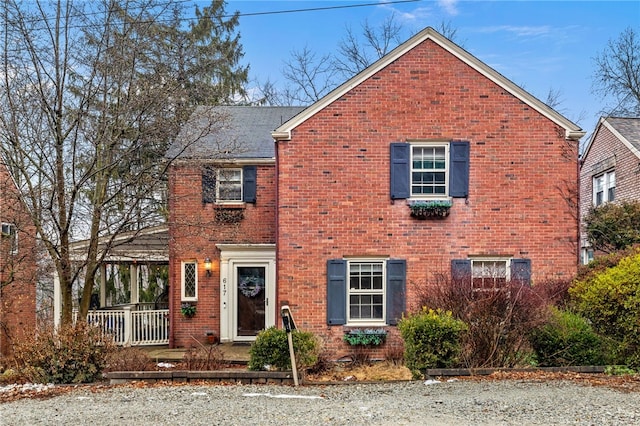 view of front of house with brick siding