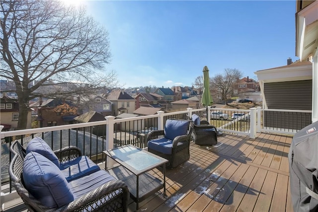 wooden deck with outdoor lounge area