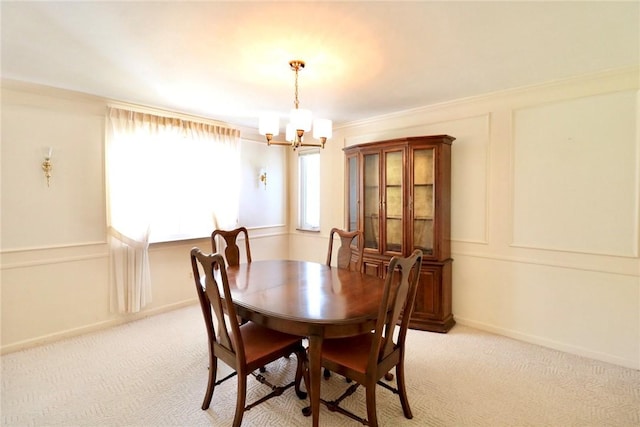 1219 Minnesota Ave, Natrona Hts/Harrison Twp, PA 15065 - dining room with baseboards, light colored carpet, and a notable chandelier