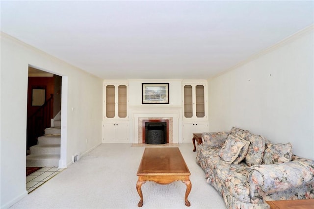 1219 Minnesota Ave, Natrona Hts/Harrison Twp, PA 15065 - living room with baseboards, visible vents, stairway, a fireplace, and ornamental molding