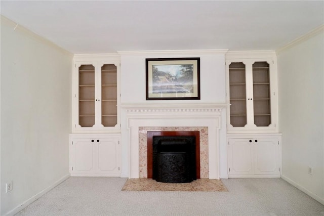 1219 Minnesota Ave, Natrona Hts/Harrison Twp, PA 15065 - unfurnished living room with baseboards, built in features, light colored carpet, a premium fireplace, and ornamental molding