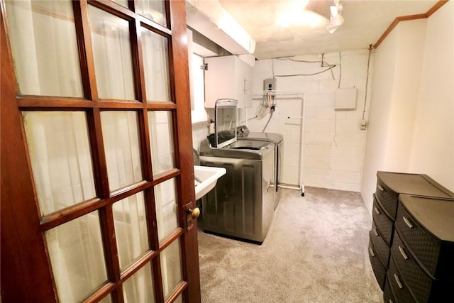 1219 Minnesota Ave, Natrona Hts/Harrison Twp, PA 15065 - laundry room featuring washing machine and clothes dryer, concrete block wall, carpet floors, and laundry area